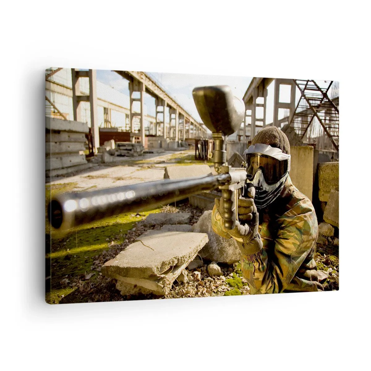 Tablou pe pânză Canvas - Un jucător de paintball în echipament de camuflaj țintește un marker - 70x50cm - Și tu poți fi erou - Decorațiune modernă pentru perete pentru living și dormitor ARTTOR